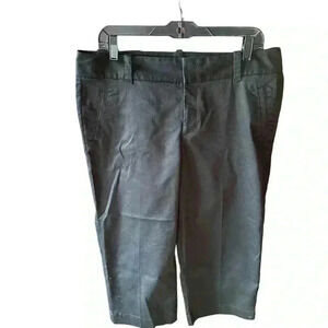 Dockers size 14‎ tall black chino capris. Flat front EUC . Vent at bottom leg.